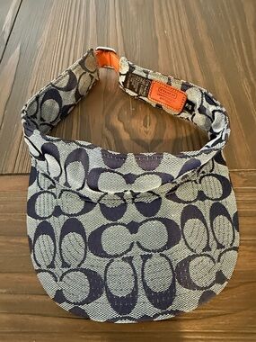 Coach Navy Signature Canvas Visor with Orange Accent